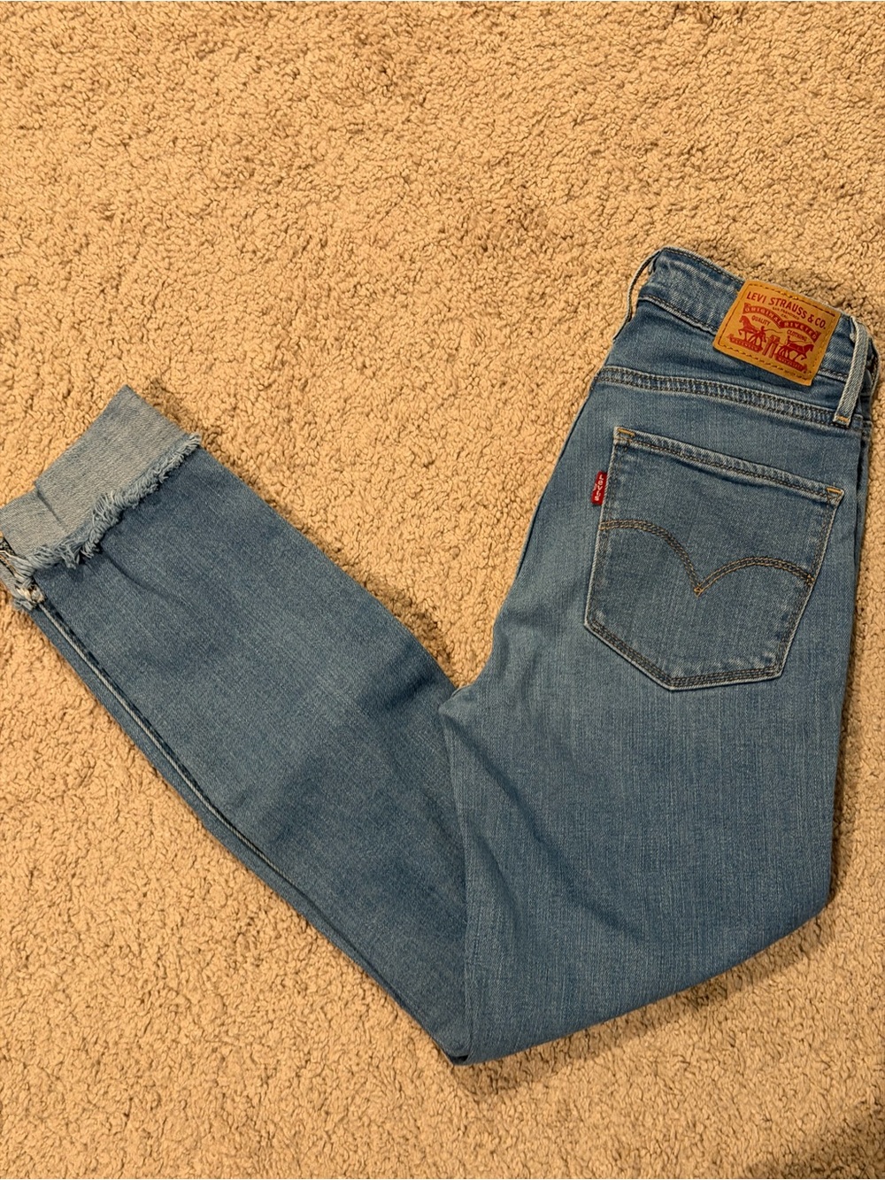 Levi's Women's Light Blue Skinny Jeans with Frayed Hem